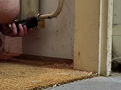 Chastity butt plug chained to radiator with ice lock