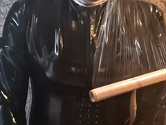 Breathing play with cling film in latex catsuit