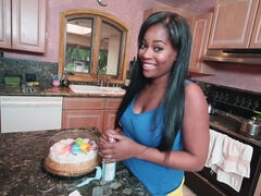 Ebony girl is making a birthday surprise