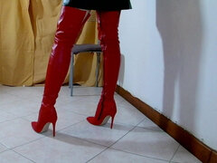 Long red boots, leather dress and gloves