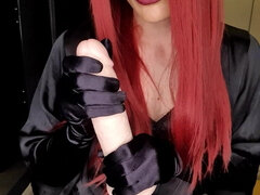 Dressed up in lingerie and as a red head, Mistress Jessica tantalises and teases away with her big 10 dildo