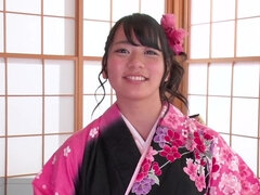 That Japanese girl looks so adorable in her kimono