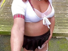 Amateur crossdresser Kellycd2022 sexy milf in mini skirt and stockings peeing her panties in heels sissy outdoors