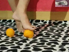 Feet, oranges and high heels