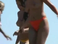 Voyeur Films a Natural Big Breasted Nudist Beach in Spain