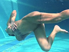 big tits and big ass underwater