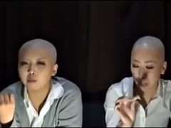 Two Japanese men shaved their heads