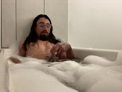 Having fun with my cock in the bubble bath