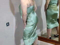 Hot crossdresser in green satin dress