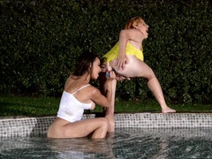 Lola Fauve and Sophia Laure pleasuring each other in the water