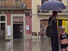 Lezdom redhead MILF shows teen slave outdoor in public