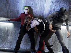 Superhero Kleio Valentien sandwiched between Joker and Batman