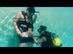 Scuba diver fucks brunette girl by the swimming pool