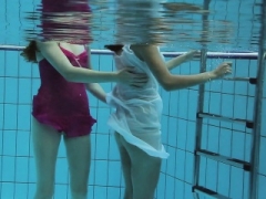 Hotly dressed teen cuties in the pool