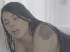 Raven-haired babe and her blonde femme caress pussies a lot