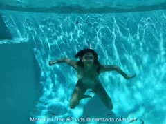 camsoda-Little young girl uses dildo during underwater