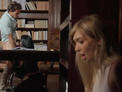 Horny librarian is banging two hot ladies on the desk