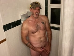 Naughty daddy talking dirty while taking a piss and stroking himself off