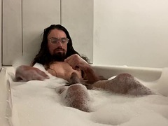 Having fun with my cock in the bubble bath