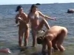 Slave gets feet trampling & humiliation on the beach by 2 mistresses