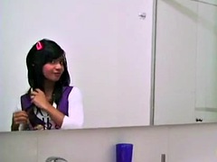 Teen Tobie with tight pussy fingers herself hard in the bathroom