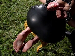 Sophia Laure is bound by her wrists and wearing a collar for anal