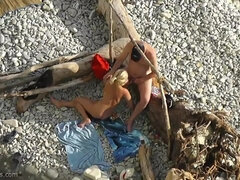 Shameless amateur senior couple makes love on the beach