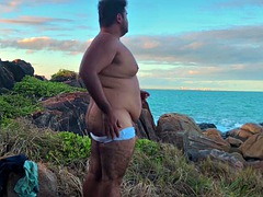 Gay Amateur Chubby gay goes to the beach to jerk off and show off his ass