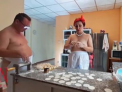 Nudist housekeeper Regina Noir cooking in the kitchen. Naked maid cooking dumplings. Naked chefs. Part 3
