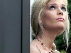 A blonde with blue eyes that loves to fool around is masturbating