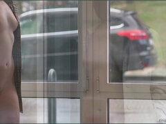 Kinky whore shows her pussy in street cafe