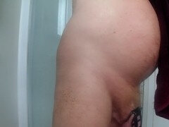 Bathroom with a cock cage for some male chastity action