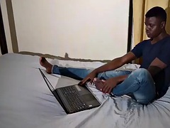 African twink strips and masturbates in indoor action