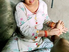 Desi stepmom Annuakhil gives her stepson a blowjob in the kitchen