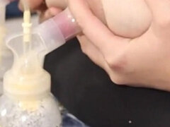 Breast Milk Pumping From the Side