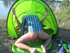 Busty brunette Eveline Neil getting fucked in a tent