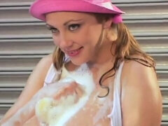 An oiled girlfriend Autumn-Jade shows off her massive melons