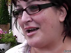 Sexy BBW tit-fucks and sucks on stranger's big dick in the restroom