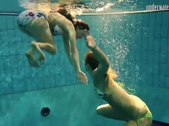 Swimming naked and horny undressing teens in the pool - Big tits