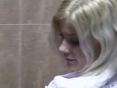 Friends share a slutty teen girl in a public bathroom