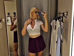 Trying on completely transparent clothes in the fitting room. Look at my boobs in a public place