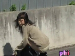 Skirt sharked girl hid between the cars to put her skirt on