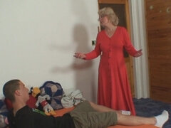 Perverted blonde GILF giving a handjob and a blowjob