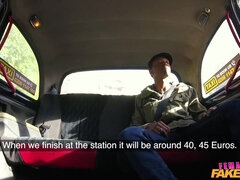 A lady taxi driver works on a big black cock in the backseat