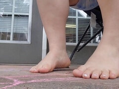 Voluptuous babe indulges in wet foot play and footjob pleasures