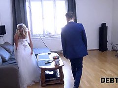 Curly blonde is enjoying sex while cuckold groom is watching