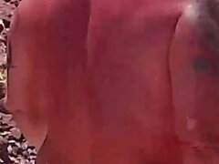 Couple Is Hiking Naked Near the Coast