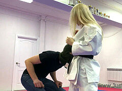 karate blond chic kneeing balls