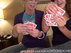 two steaming dolls losing at game of disrobe poker