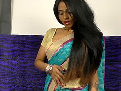 Horny Lily from India shows off her Indian moves while fingering her mature pussy in solo audio clip